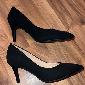 Black close toed high heel shoes